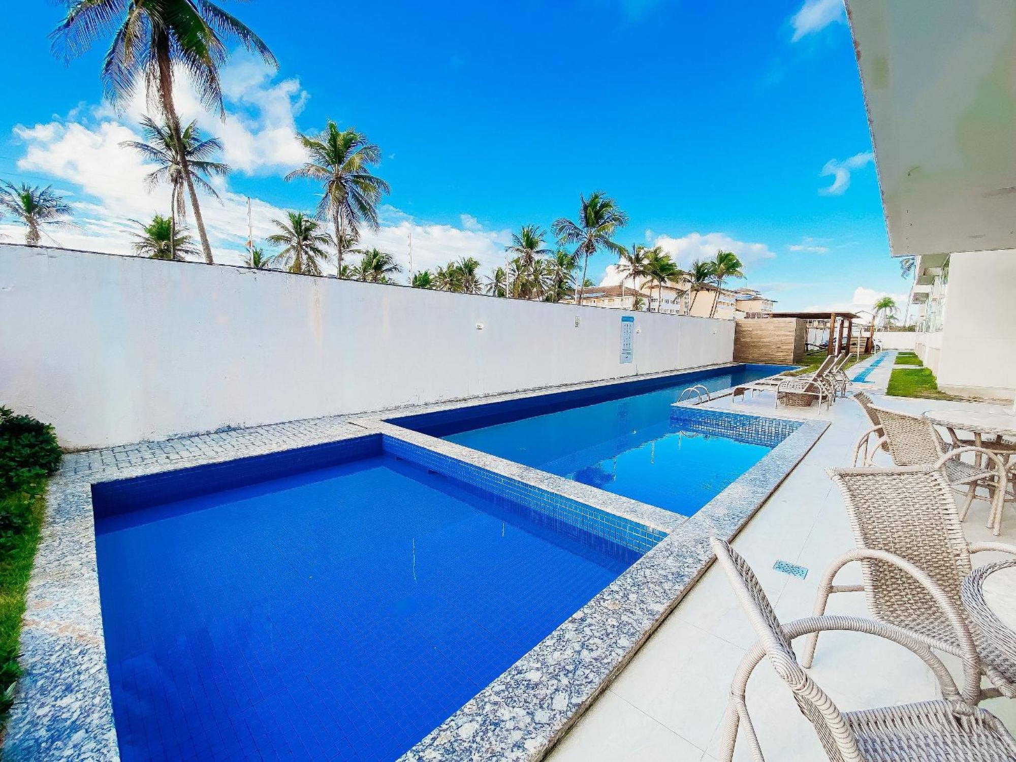 Apartamento Residencial Ilha De Santorini: Beachfront Oasis With Surf, Pool & Fitness Salvador